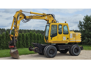 Grävmaskin på däck ATLAS