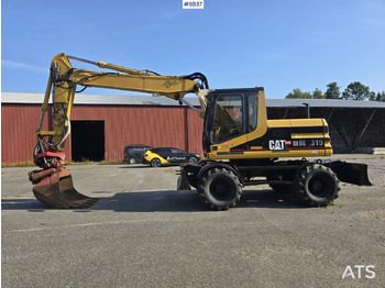 Grävmaskin på däck CATERPILLAR M315