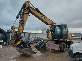 Grävmaskin på däck CATERPILLAR M313D