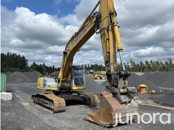 Bandgrävare NEW HOLLAND