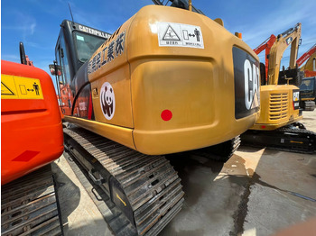 Bandgrävare CATERPILLAR 323D