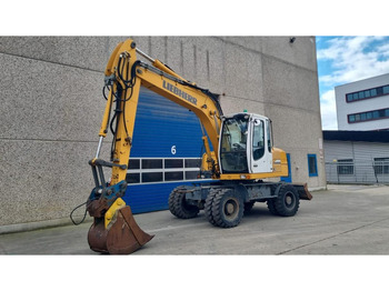 Grävmaskin på däck LIEBHERR A 314