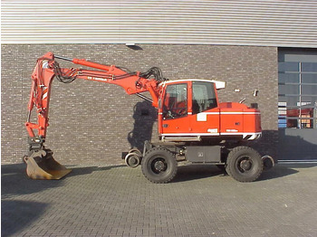 Grävmaskin på däck TEREX