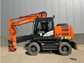 Grävmaskin på däck HITACHI ZX140W-5
