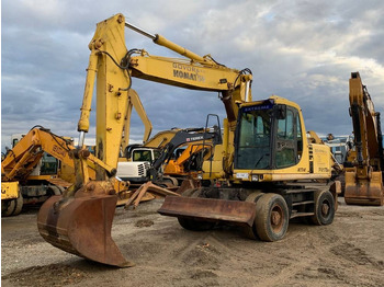 Grävmaskin på däck KOMATSU