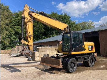 Grävmaskin på däck CATERPILLAR M316D