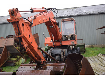 Grävmaskin på däck ATLAS