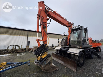Grävmaskin på däck HITACHI ZX140W-3