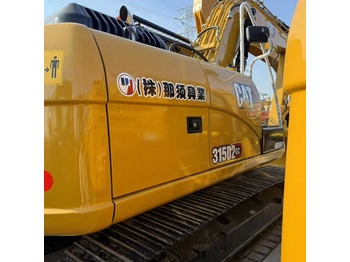 Bandgrävare CATERPILLAR