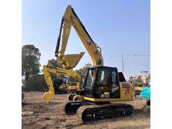 Grävmaskin på däck CATERPILLAR 312