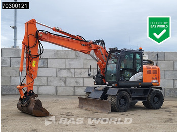 Grävmaskin på däck HITACHI ZX140W-6