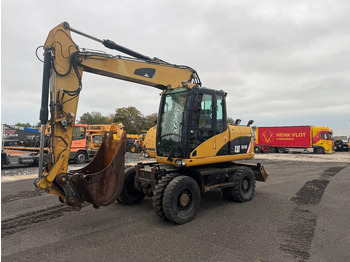 Grävmaskin på däck CATERPILLAR M313D