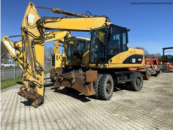 Grävmaskin på däck CATERPILLAR M315D