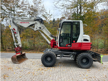 Grävmaskin på däck TAKEUCHI