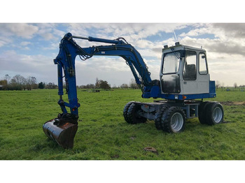 Grävmaskin på däck ATLAS