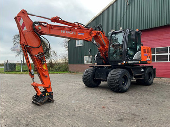 Grävmaskin på däck HITACHI