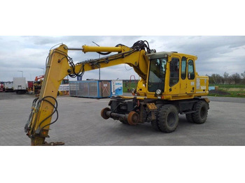 Grävmaskin på däck ATLAS