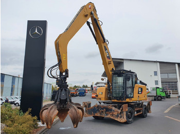 Grävmaskin på däck CATERPILLAR MH3024