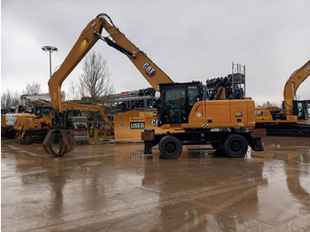 Grävmaskin på däck CATERPILLAR MH3024