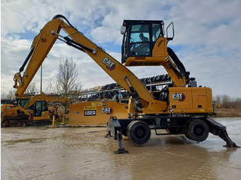 Grävmaskin på däck CATERPILLAR MH3024
