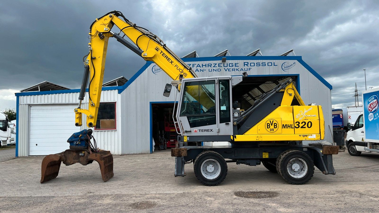 Fuchs TeRex MHL 320 D Umschlagbagger Greifer Pratzen - Materialhanterare: bild 1 Fuchs TeRex MHL 320 D Umschlagbagger Greifer Pratzen - Materialhanterare: bild 1