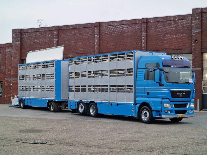 MAN TGX 26.440 6x2*4 - 3 deck Livestock - Water & Ventilation + Jumbo/Bekkers 3 deck trailer - Djurtransport lastbil: bild 1 MAN TGX 26.440 6x2*4 - 3 deck Livestock - Water & Ventilation + Jumbo/Bekkers 3 deck trailer - Djurtransport lastbil: bild 1