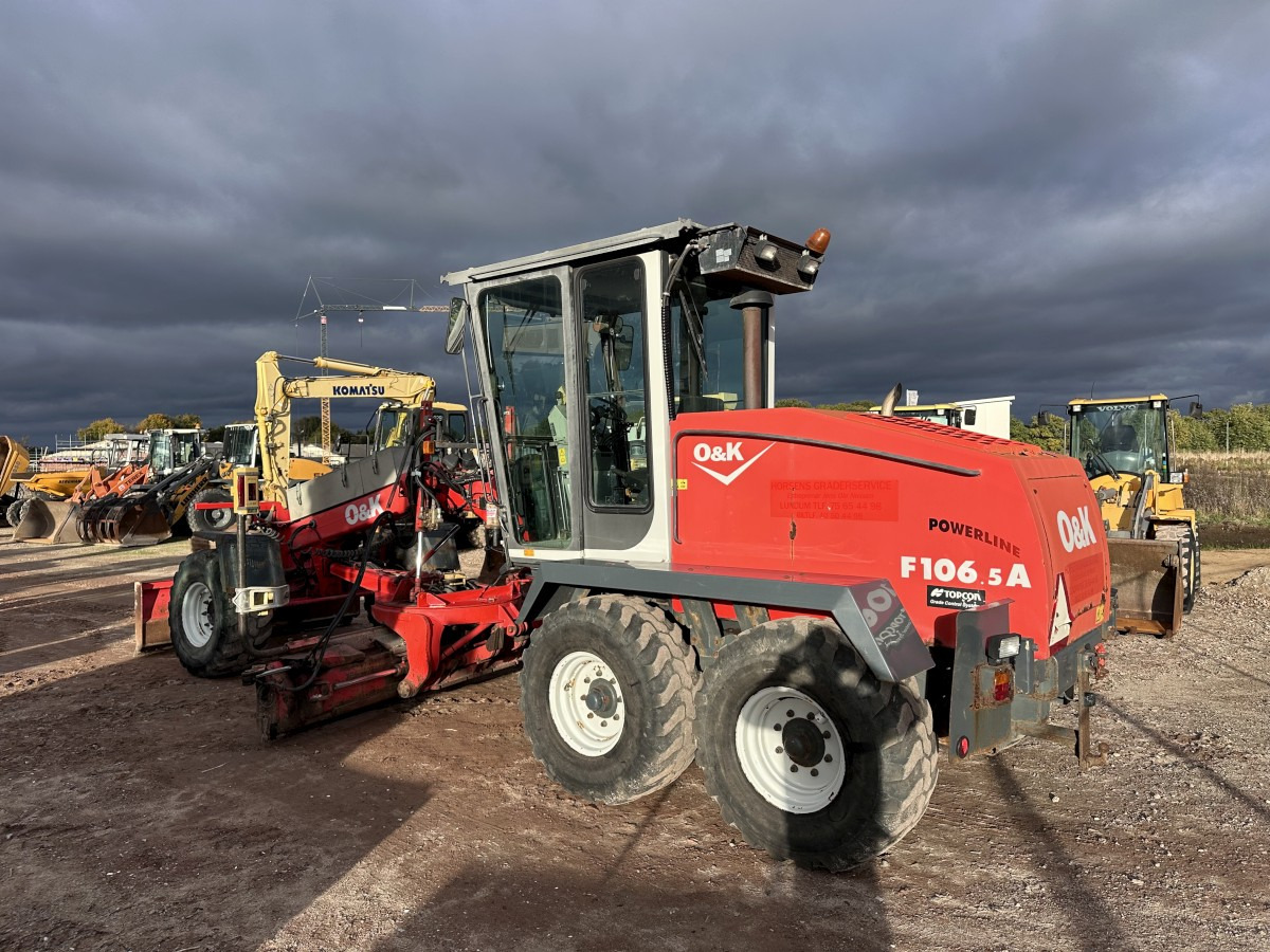 O&K F 106.5 - 6x6 Laser Topcon- Klima Cummins 6 Zyl. - Väghyvel: bild 5 O&K F 106.5 - 6x6 Laser Topcon- Klima Cummins 6 Zyl. - Väghyvel: bild 5