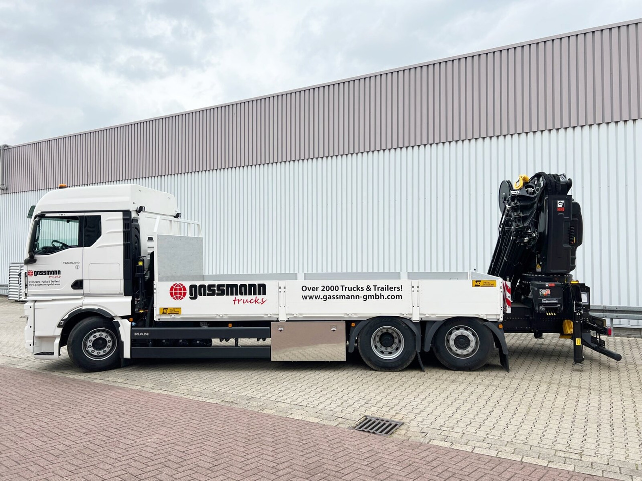 MAN TGX 26.510 6x2-4 LL CH TGX 26.510 6x2-4 LL, Kran Hiab X-HiPro 548 E-8, Lenk-/Liftachse, TwistLock 20Fuß, Funk, Retarder - Kranbil, Flakbil: bild 2 MAN TGX 26.510 6x2-4 LL CH TGX 26.510 6x2-4 LL, Kran Hiab X-HiPro 548 E-8, Lenk-/Liftachse, TwistLock 20Fuß, Funk, Retarder - Kranbil, Flakbil: bild 2