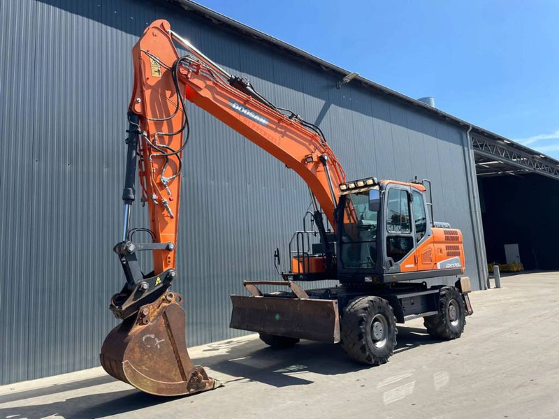 Doosan DX170W-5 - Grävmaskin på däck: bild 1 Doosan DX170W-5 - Grävmaskin på däck: bild 1