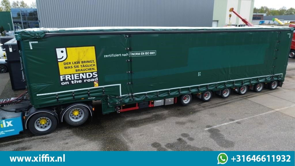 Meusburger 6-ass. Semi dieplader met elektrische huifopbouw / 3x naloop gestuurd - Låg lastare semitrailer: bild 1 Meusburger 6-ass. Semi dieplader met elektrische huifopbouw / 3x naloop gestuurd - Låg lastare semitrailer: bild 1