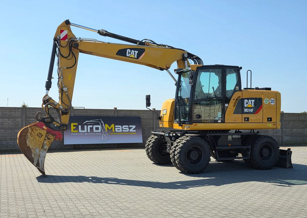 Caterpillar M314F, 2019 ROK, 3300 MTH, OIL QUICK OQ 65 - Grävmaskin på däck: bild 1 Caterpillar M314F, 2019 ROK, 3300 MTH, OIL QUICK OQ 65 - Grävmaskin på däck: bild 1