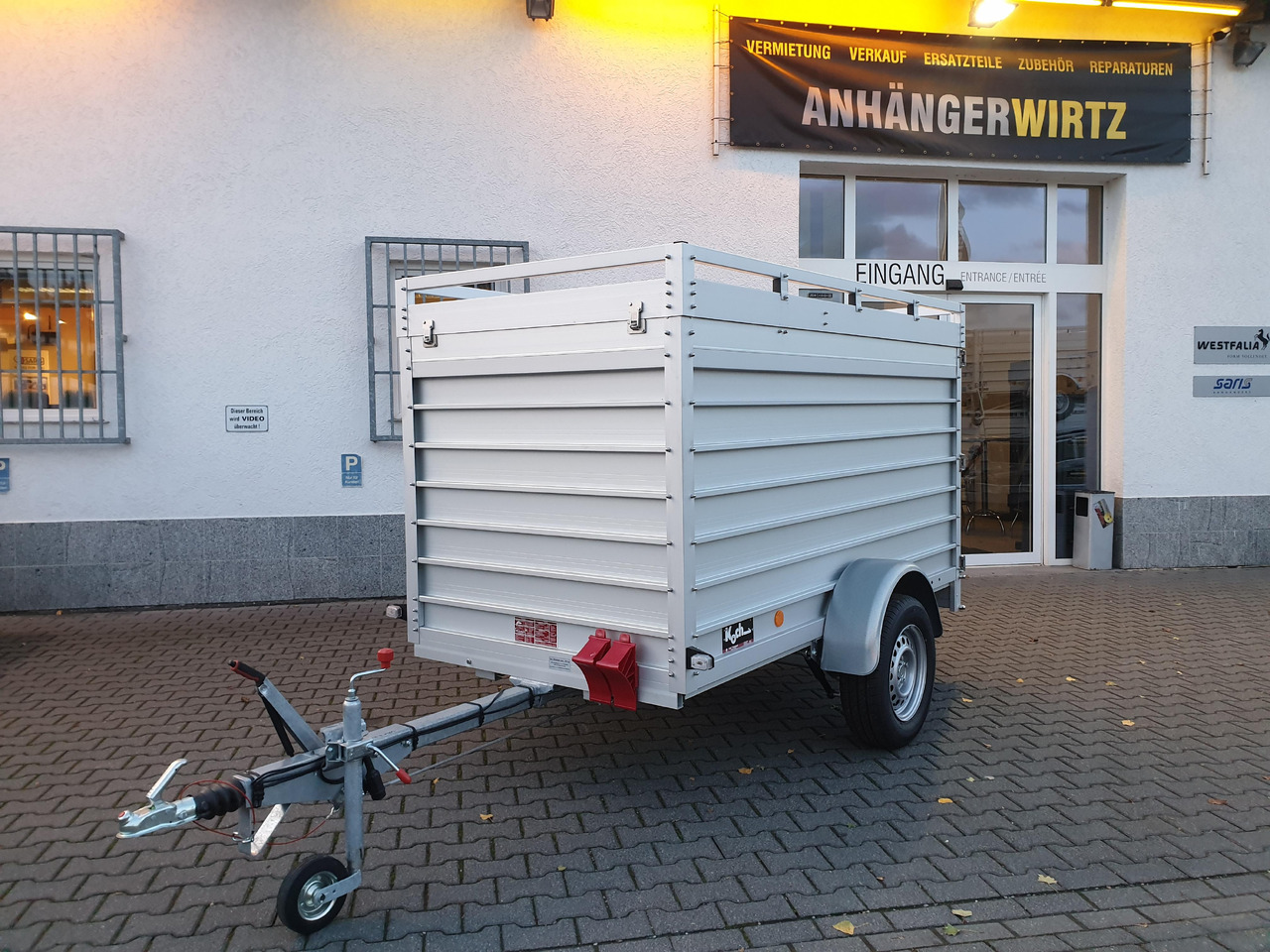 PKW Anhänger Koch Aluline 4.13 Deckel Hecktür Aluboden DV 250x125x125cm 1300kg 100 km/H Modell 23 - Skåpsläp: bild 1 PKW Anhänger Koch Aluline 4.13 Deckel Hecktür Aluboden DV 250x125x125cm 1300kg 100 km/H Modell 23 - Skåpsläp: bild 1