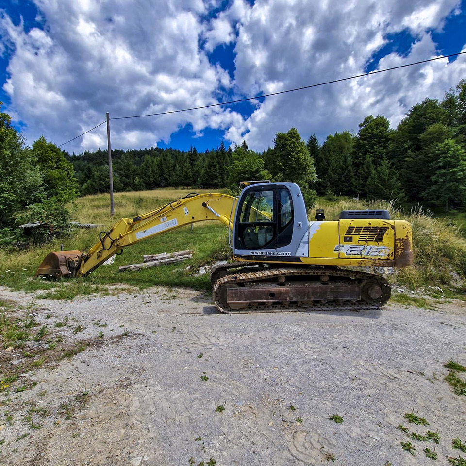 New Holland Kobelco E215 - Bandgrävare: bild 1 New Holland Kobelco E215 - Bandgrävare: bild 1