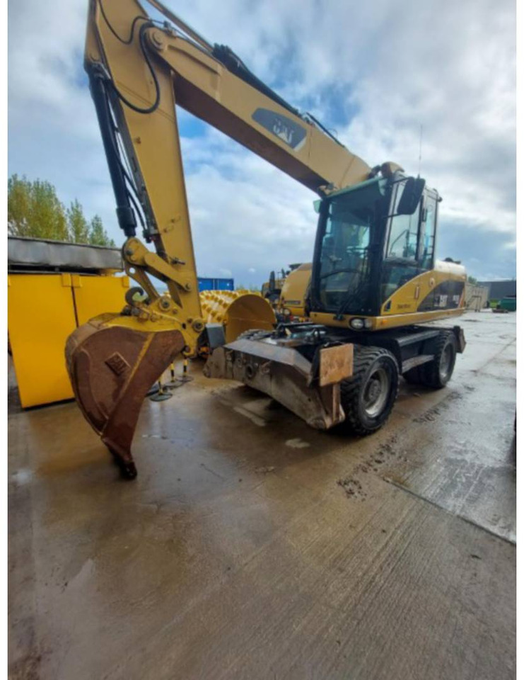 CAT M315D - Grävmaskin på däck: bild 1 CAT M315D - Grävmaskin på däck: bild 1