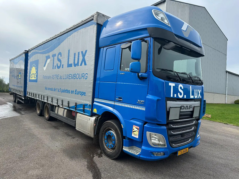 DAF XF 440 6x2 / SUPERSPACECAB / KOMBI MIT ANHANGER SCHMITZ 2016 / DURCHLADEN / 2 STUCK - Kapellbil: bild 2 DAF XF 440 6x2 / SUPERSPACECAB / KOMBI MIT ANHANGER SCHMITZ 2016 / DURCHLADEN / 2 STUCK - Kapellbil: bild 2