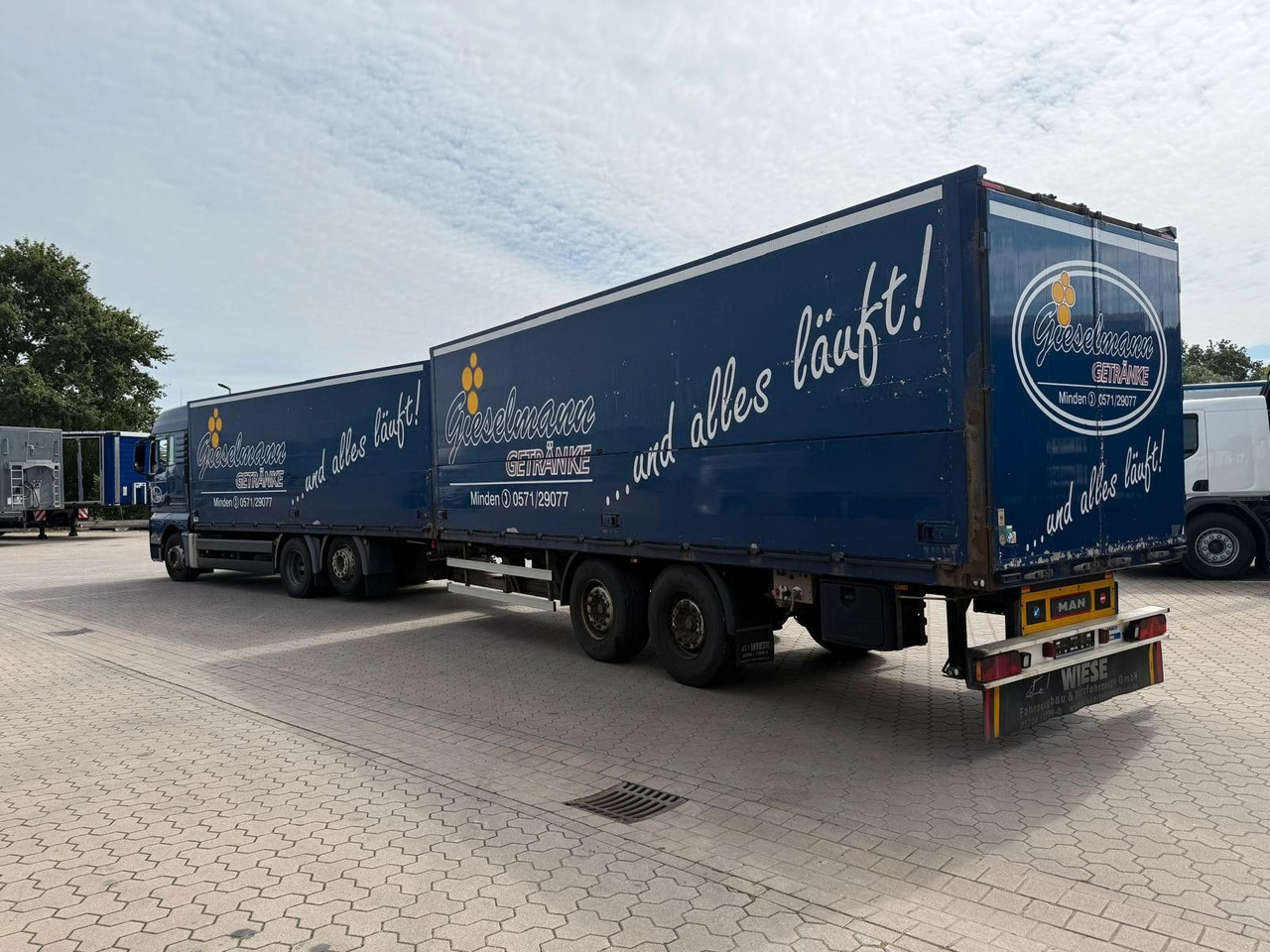 MAN TGA mit Kofferaufbau/Getränkeaufbau + Anhänger - Dryckestransport lastbil: bild 4 MAN TGA mit Kofferaufbau/Getränkeaufbau + Anhänger - Dryckestransport lastbil: bild 4