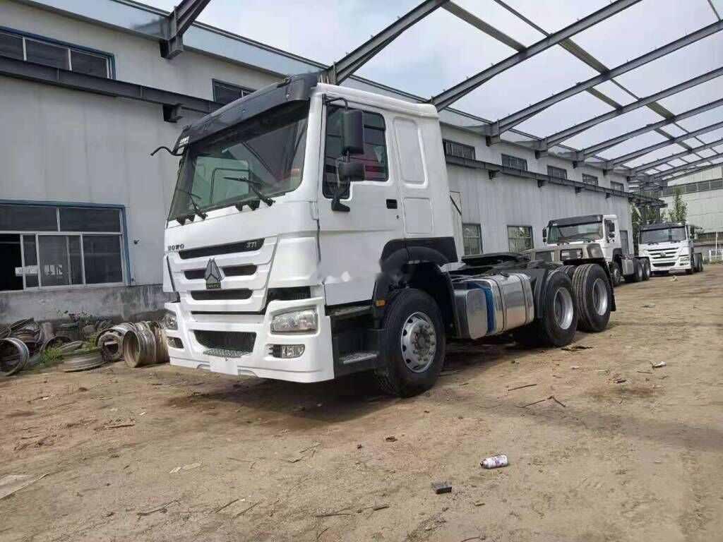 Sinotruk HOWO 6*4 Tractor - Containerbil/ Växelflak lastbil: bild 1 Sinotruk HOWO 6*4 Tractor - Containerbil/ Växelflak lastbil: bild 1