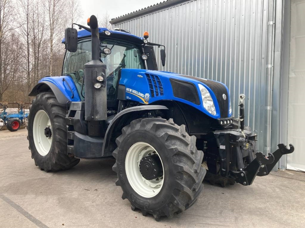 New Holland T 8.320 AC - Traktor: bild 1 New Holland T 8.320 AC - Traktor: bild 1