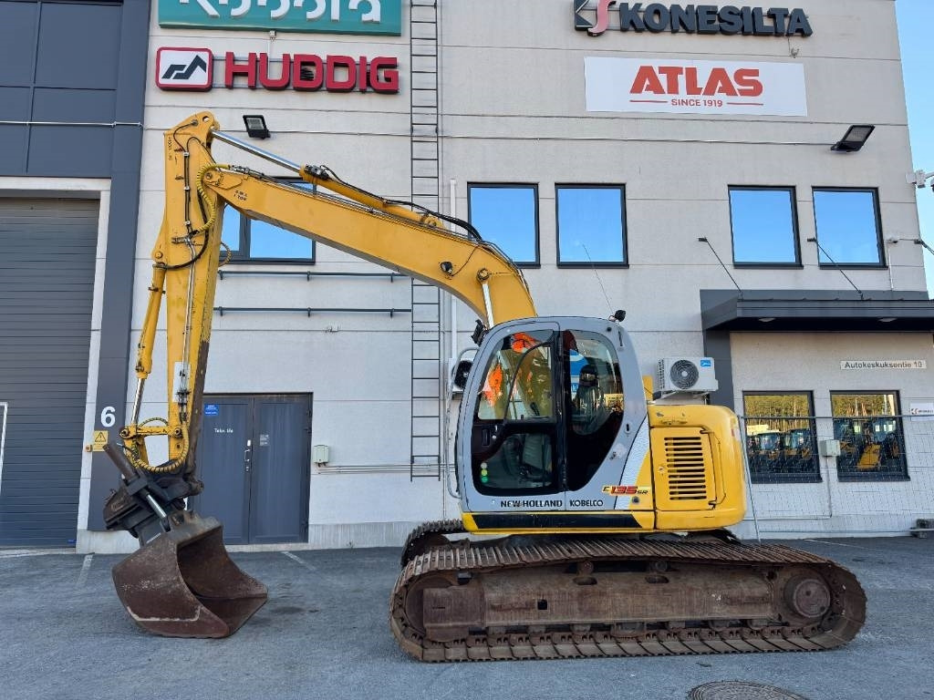 New Holland E 135 SR LC  - Bandgrävare: bild 1 New Holland E 135 SR LC  - Bandgrävare: bild 1