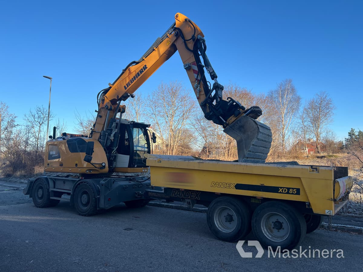 Hjulgrävare Liebherr 918 Compact Litronic med kärra - Bandgrävare: bild 1 Hjulgrävare Liebherr 918 Compact Litronic med kärra - Bandgrävare: bild 1