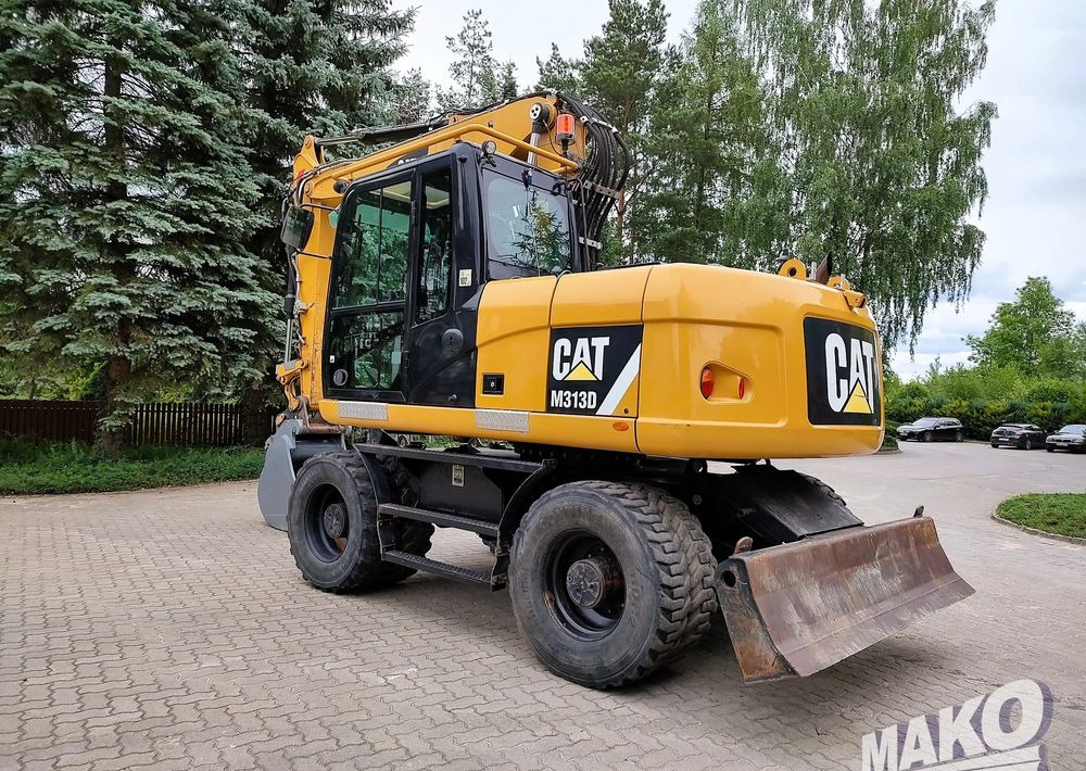 Caterpillar M313D - Grävmaskin på däck: bild 2 Caterpillar M313D - Grävmaskin på däck: bild 2