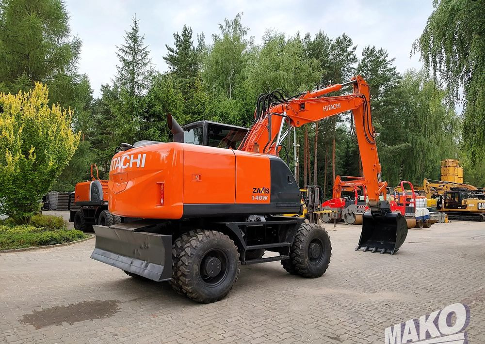 Hitachi ZX 140 - Grävmaskin på däck: bild 4 Hitachi ZX 140 - Grävmaskin på däck: bild 4