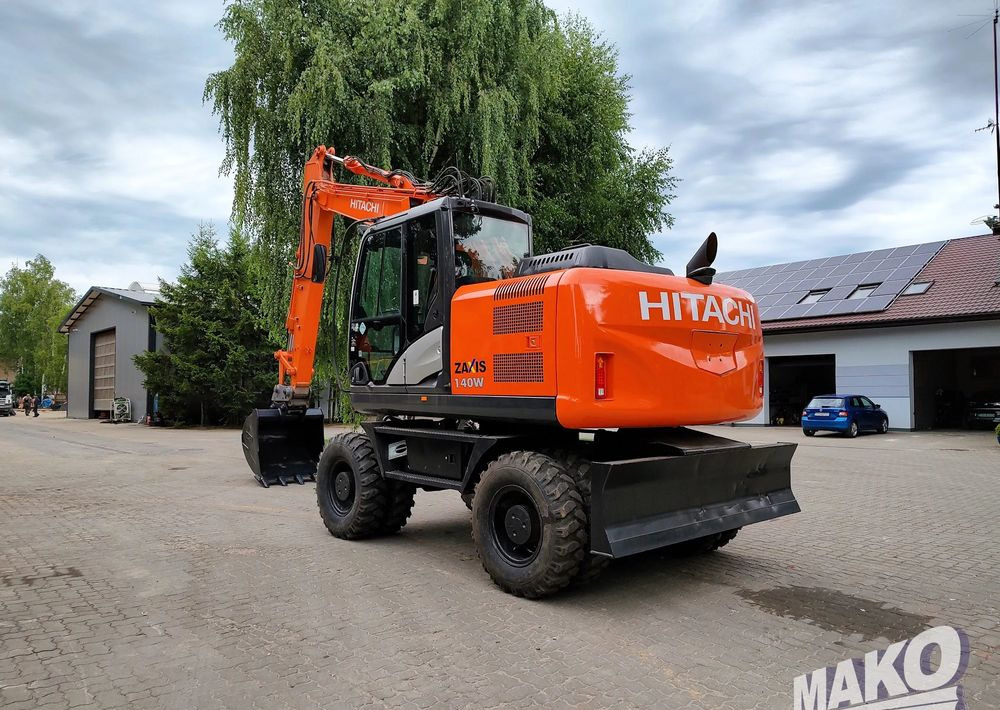 Hitachi ZX 140 - Grävmaskin på däck: bild 2 Hitachi ZX 140 - Grävmaskin på däck: bild 2