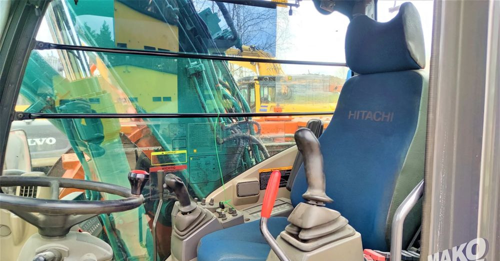 Grävmaskin på däck Hitachi ZX140W-3: bild 10