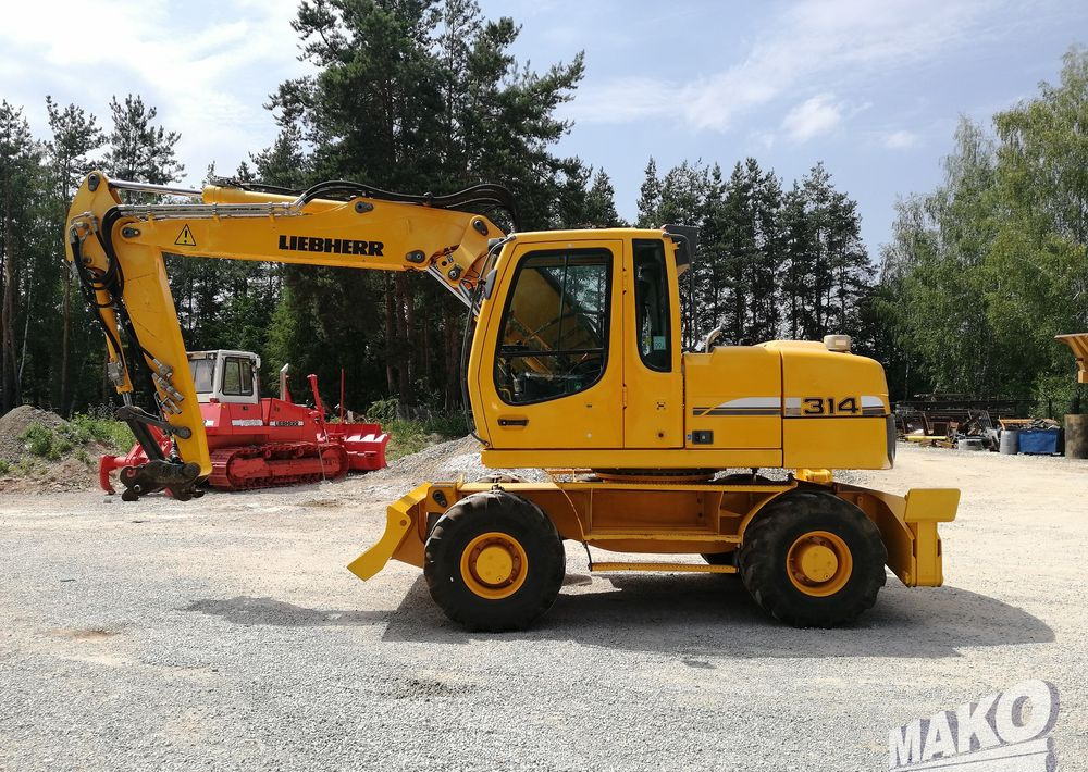 Liebherr A 314 Litronic - Grävmaskin på däck: bild 2 Liebherr A 314 Litronic - Grävmaskin på däck: bild 2