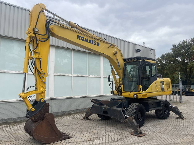 Komatsu PW 180-7EO 2009 - Grävmaskin på däck: bild 1 Komatsu PW 180-7EO 2009 - Grävmaskin på däck: bild 1
