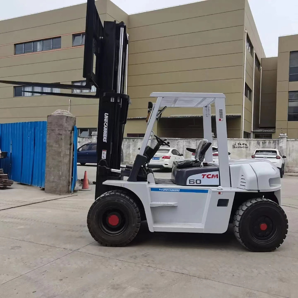TCM 6 ton Diesel Forklift FD60 with Fork Positioner - Dieseltruck: bild 1 TCM 6 ton Diesel Forklift FD60 with Fork Positioner - Dieseltruck: bild 1