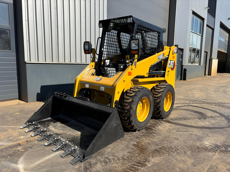 Caterpillar 216B3 - Lastare: bild 1 Caterpillar 216B3 - Lastare: bild 1