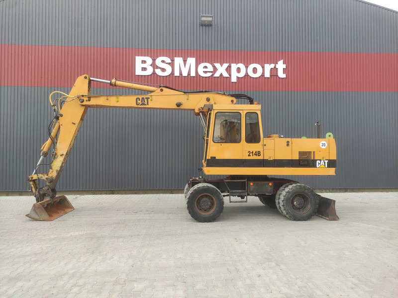 Caterpillar 214 B wheel excavator - Grävmaskin på däck: bild 1 Caterpillar 214 B wheel excavator - Grävmaskin på däck: bild 1