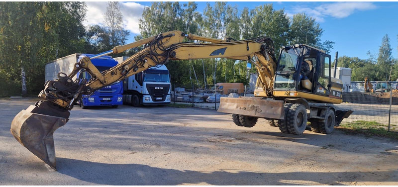 Caterpillar M 315 Rototilt - Grävmaskin på däck: bild 4 Caterpillar M 315 Rototilt - Grävmaskin på däck: bild 4